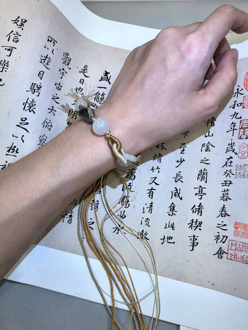 Rejoice bracelet from EBIG Jewel on writing