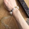 Rejoice bracelet from EBIG Jewel on wrist with incense